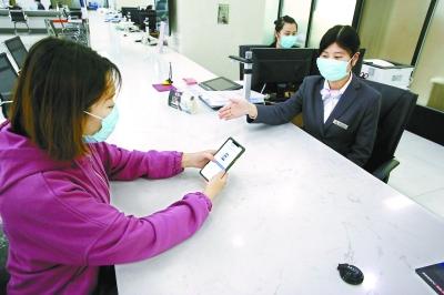 无需一堆证件、刷脸办业务，北京七类电子证照上了区块链