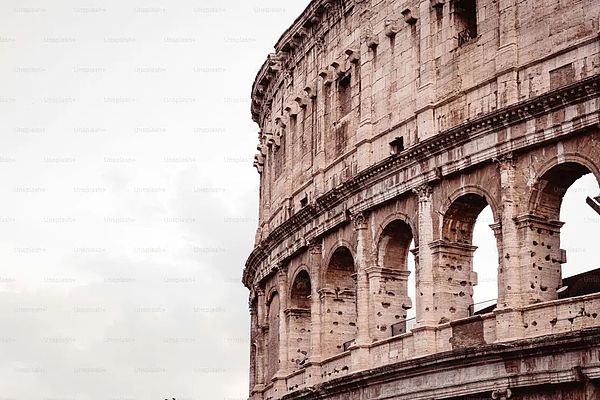 a very old looking building with a clock on it's side