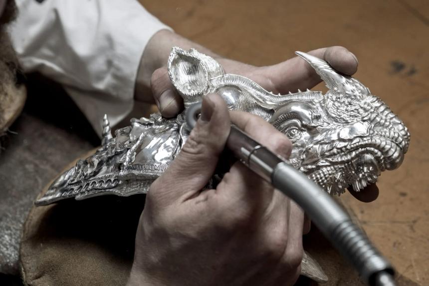 Silver sculptor at work.