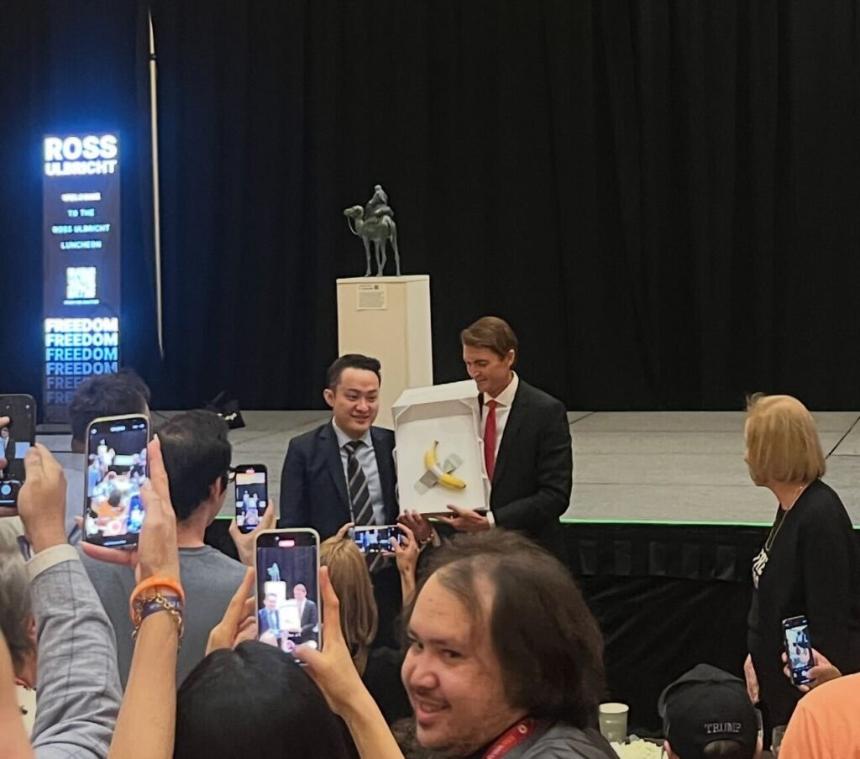 Skull, $5 million; Banana, $6 million; Freedom, Priceless 1 picture of Ross receiving banana from Justin Sun